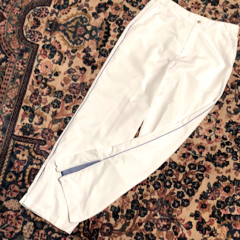 Ralph Lauren nylon golf pants sz 8. Blue stripe detail. Zip pant leg shows blue.